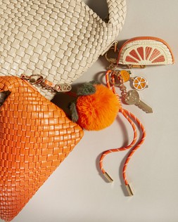 Dune London Juice & Juicy 49 GBP orange key charm www.dunelondon.com campaign shot 2