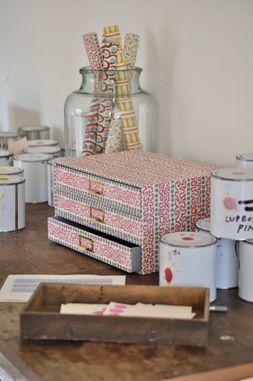A Flight of Charleston Patterned Paper-Covered Collector's Drawers
