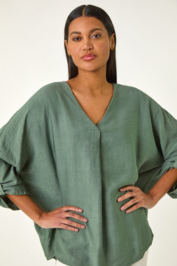 Roman Pleated V-Neck Stretch Tunic Top