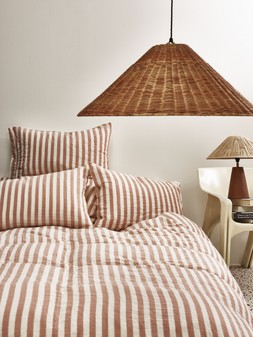 Oliver Bonas Stripe Muslin Bedlinen Set £75 £85 - Terracotta Table Lamp £98 - Delphine Pendant Lampshade £85