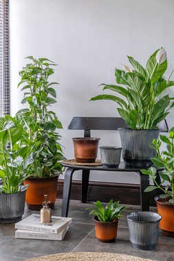 JASPER METAL RIBBED TAPERED PLANTER IN SMOKEY BLUE AND BURNT ORANGE £10.99 TO £39.99