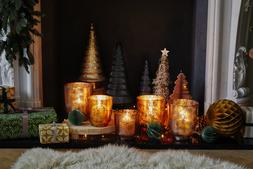 Metallic Copper Glass Holder H19Cm W15.5Cm &pound;39.99, Metallic Copper Glass Holder H19Cm W15.5Cm &pound;34.99, Metallic Gold Glass Holder H15Cm W13.3Cm &pound;19.99, Metallic Gold Glass Holder H19Cm W15.5Cm &pound;34.99