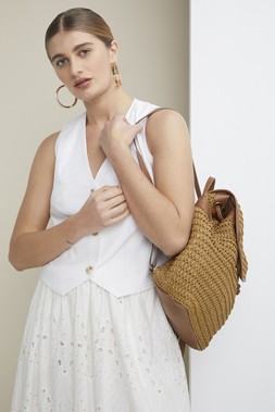White Linen Waistcoat &pound;22, White Broderie Maxi Skirt &pound;28, Straw Rucksack &pound;15, Taupe Sandals &pound;15.