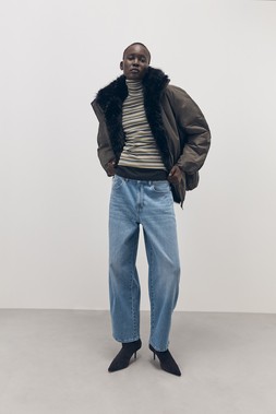 Tu-AW26-Model-16 - Khaki Faux Fur Trim Bomber Jacket £48, Mid Denim Core Barrel Jeans £22.50, Suede Point-Toe Ankle Boot £45