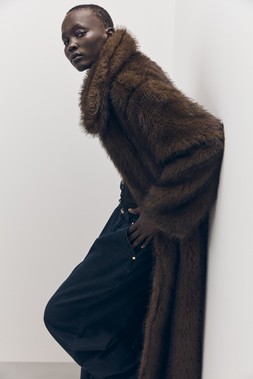 Tu-AW26-Model-22 - Brown Longline Faux Fur Coat £55 & Dark Denim Balloon Jean £22.50