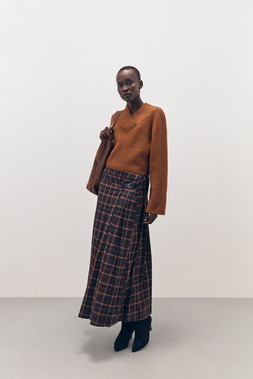 Tu-AW26-Model-38 - Slouch Shoulder Bag £24, Lambswool Envelope-Neck Jumper £38, Burgundy Check Kilt £28, Heel Boot £45 