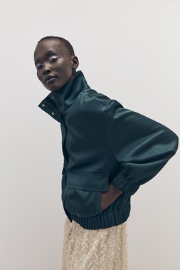 Tu-AW26-Model-59 - Teal Heavy Satin Bomber Jacket £35, Neutral Sequin Tassel Midi Skirt £36 